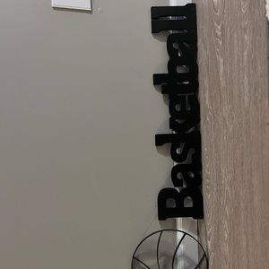 Basketball sign with metal basketballs